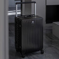 Valise de voyage noire haut de gamme avec roues pivotantes et poignée télescopique, élégante et résistante.